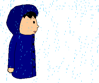 梅雨の時期に降る雨にたっている男性。
